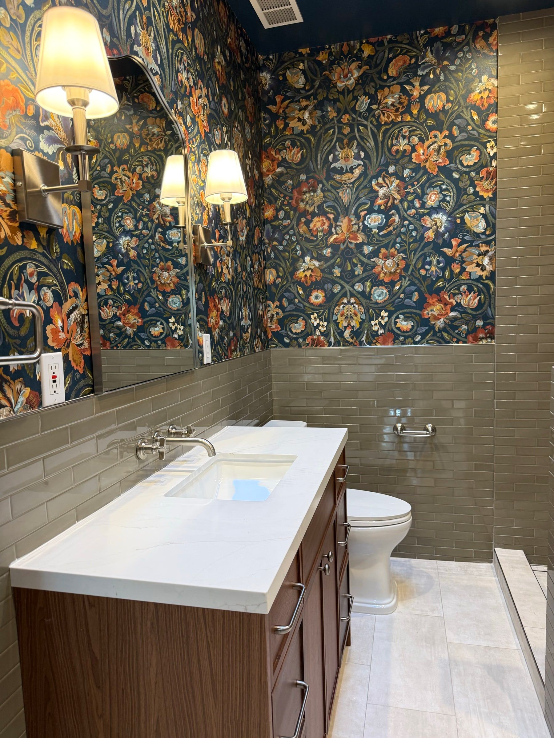 Remodeled bathroom vanity and floor left dust-free after post-construction cleaning